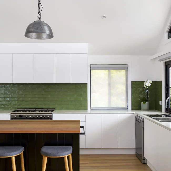 kitchen renovation with green splashback